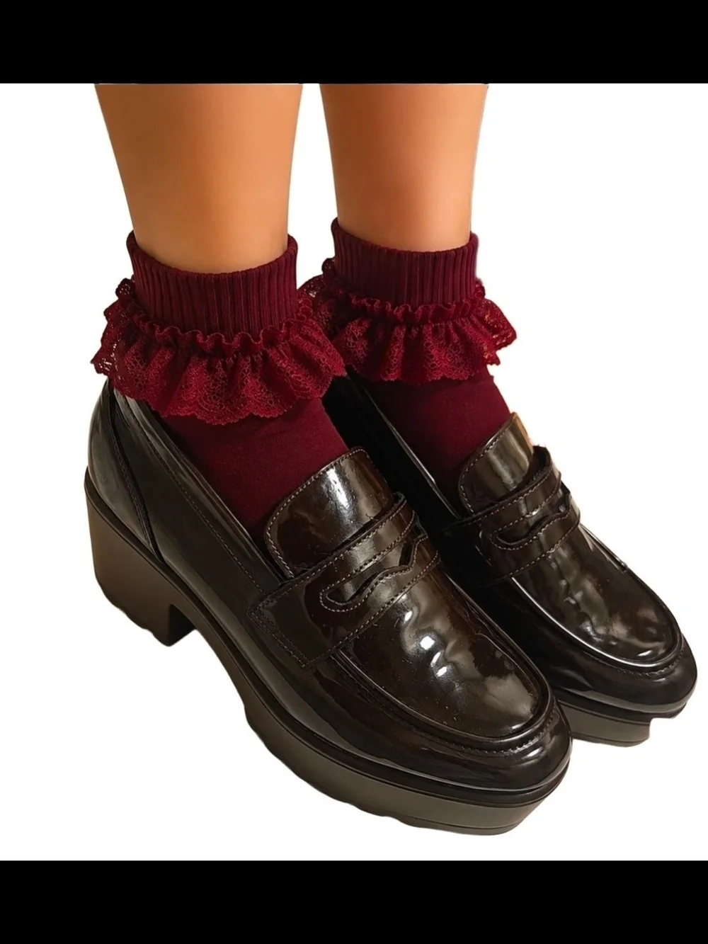 CUCCOO  patent platform penny loafers with chunky block heels and a sleek g